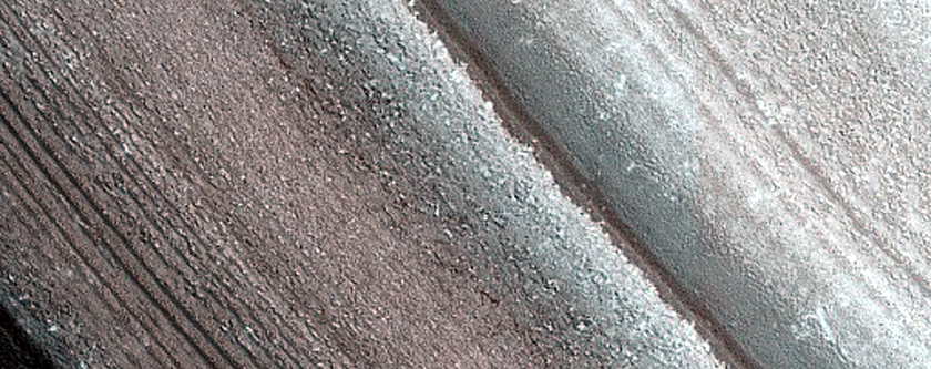 Pits in Exposure of North Polar Layered Deposits