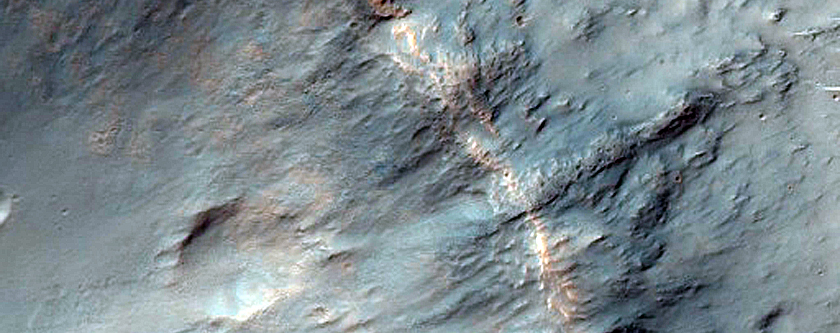 Spectrally Distinct Crater Ejecta in Tyrrhena Terra 