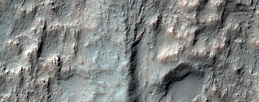 Crater Floor Mound Located at Junction of Linear Ridges