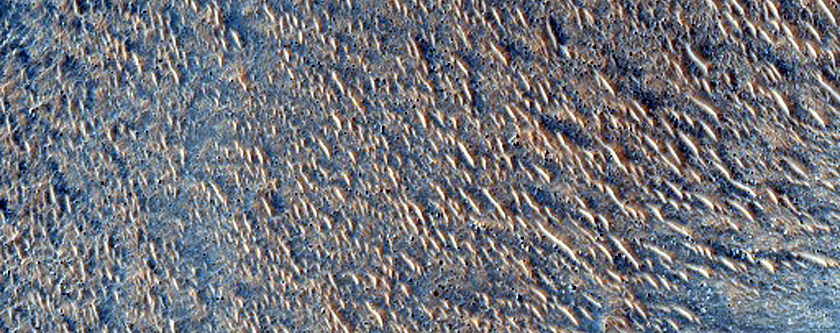 Dipping Layers Against Mound in Northern Mid-Latitudes