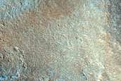Dipping Layers in Crater in Deuteronilus Mensae
