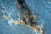 Flow Feature Associated with Nearby Well-Preserved 6-Kilometer Crater
