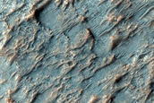 Light-Toned Outcrops in Plains Units North of Hellas Planitia
