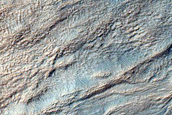 Monitor Gullied Slopes of Impact Crater
