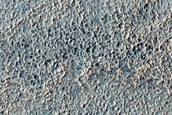 Channel in Aonia Terra
