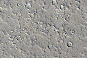 Crater Crosscut by Extensional Features
