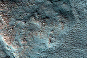 Thermokarst Depressions and Channels in Lyot Crater
