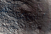 Dipping Layers Near Moreux Crater
