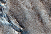 Layered Feature in Crater in Deuteronilus Mensae
