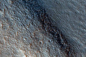 Flows Interacting with Mounds South of Deuteronilus Mensae
