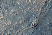 Layered Material in Intermountain Valleys West of Argyre Planitia
