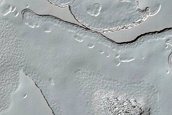 South Polar Cap Vertical Change Monitoring
