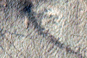 Pit and Scarp in Mantle Deposit
