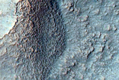 Well-Preserved 7-Kilometer Crater with Bedrock Exposure
