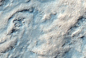 Possible Impact Crater on South Polar Layered Deposits
