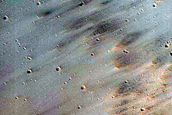 Well-Preserved 2-Kilometer Crater on Steep Slope in Tithonium Chasma
