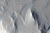 Stratified Material Near Memnonia Sulci
