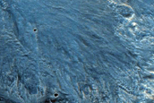 Flow Feature Associated with Nearby Well-Preserved 6-Kilometer Crater
