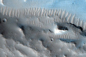 Channel on Edge of Crater West of Idaeus Fossae
