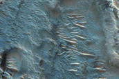 Bright Deposits in Channel South of Peraea Cavus
