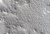 Layered Feature in Depression in Ismeniae Fossae
