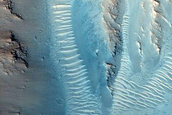 Possible Layers in Crater Wall Near Kasei Valles
