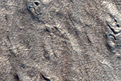 Layered Feature in Crater North of Arabia Region
