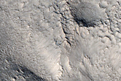 Small Mounds on Rim of Moreux Crater

