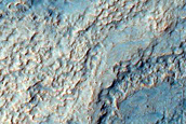 Diverse Layers and Morphologies in North Rim of Hellas Planitia
