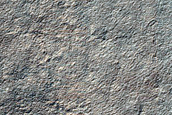Possible Impact Crater on Promethei Lingula
