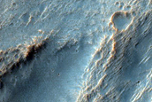 Possible Olivine-Rich Crater Ejecta in Terra Sirenum
