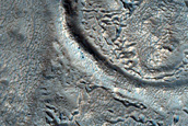 Layered Feature in Crater North of Arabia Region
