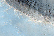 2-Kilometer Diameter Crater South of Ius Chasma
