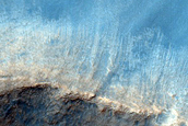 Flow Over Crater Rim in Far Eastern Daedalia Planum
