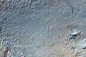 Gullied Uplift of Large Impact Crater
