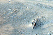 Layered Deposits near Ganges Chasma
