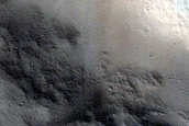 Possible Old Tongue-Shaped Flow on Crater Floor in Acheron Fossae
