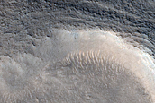 Dipping Layers in Depression in Ismenius Fossae
