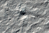 Possible Small Crater in Promethei Lingula
