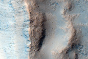 Possible Olivine-Rich Ejecta in Terra Sirenum
