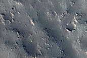 Crater on Tectonic Terrain
