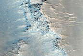 Streamlined Features and Fractures in Hebrus Valles
