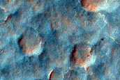 Polyphase Exit Breach in Small Crater on East Rim of Holden Crater
