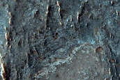 Olivine-Rich Crater Ejecta in Thaumasia Planum
