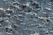 Edge of Crater Floor Deposit with Possible Olivine Signature
