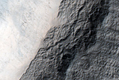 Possible Olivine-Rich Pedestal Crater in Terra Sirenum
