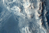 Light-Toned Material Exposed in Spur on West Candor Chasma Wall
