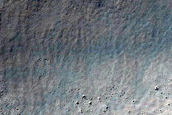 Valleys in Aonia Terra

