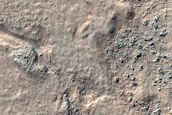 Ridge-Forming Unit Overlying Dark Curved Unit South of Greeley Crater
