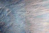 Intersection Between Fresh Crater and Fluvial Valleys

